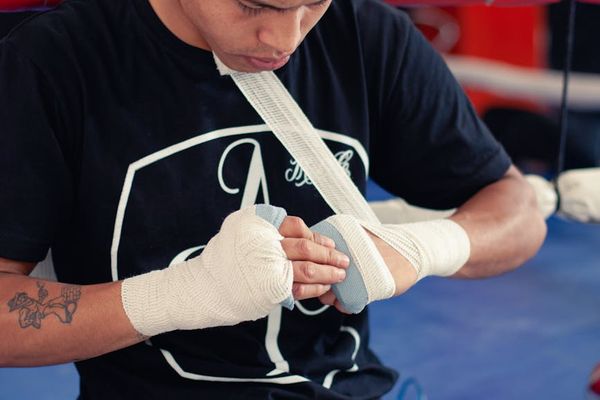 Man in a focused stance preparing for an exercise.
